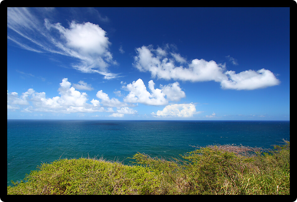 Wispy clouds form off the coast on the Caribbean island of Saint Kitts.