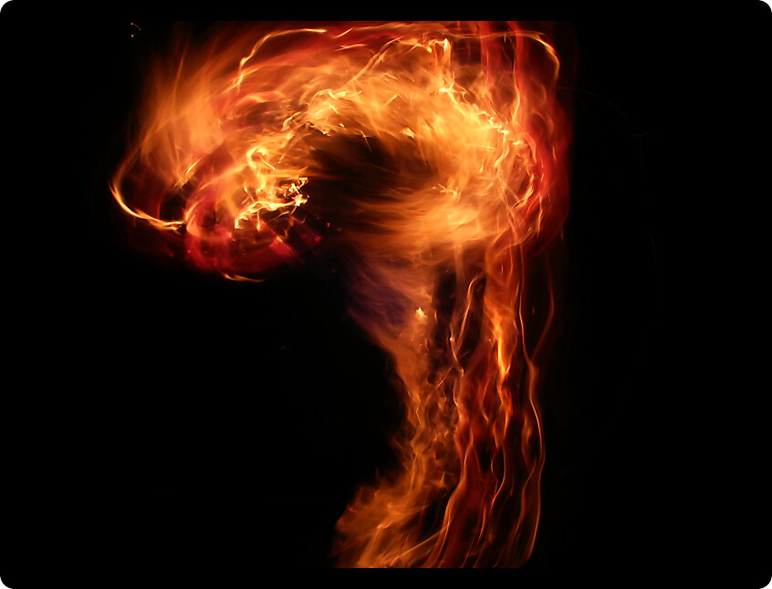 Bright and swirling question mark of flame.