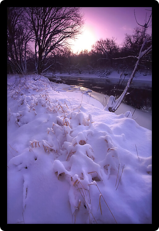 Sunrise over fresh snowfall at Blackhawk Springs Forest Preserve in northern Illinois.