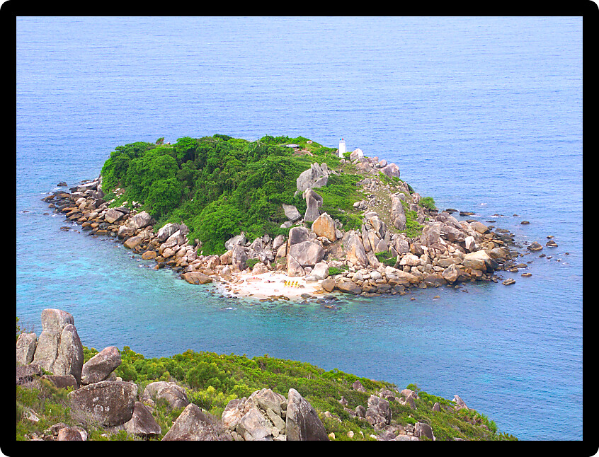 View of Little Fitzroy Island from Fitzroy Island in Queensland Australia.