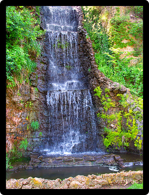 Beautiful waterfall flowing at Krape Park in northern Illinois.