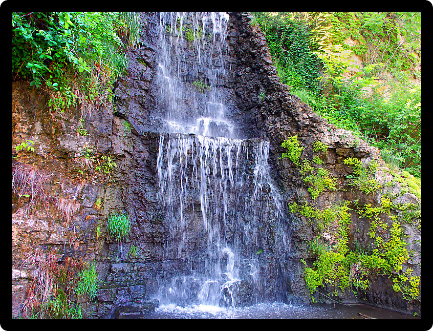 Beautiful waterfall flowing at Krape Park in northern Illinois.