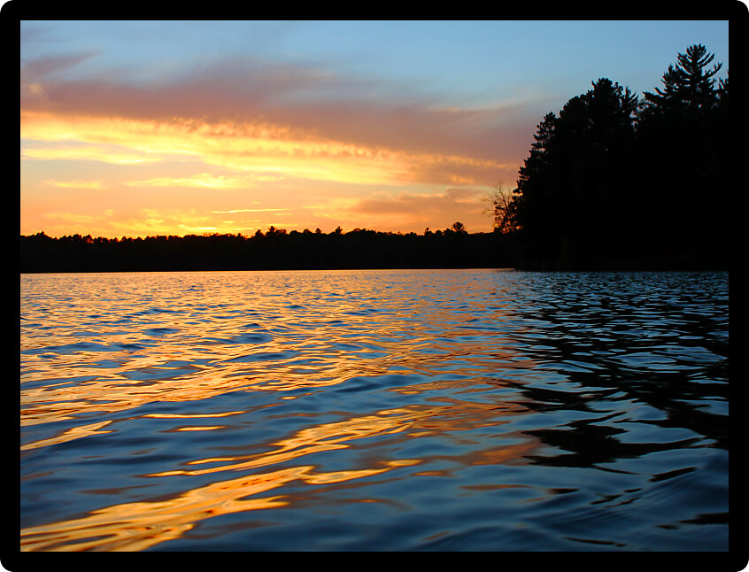 Sunlight reflects off ripples of Sweeney Lake in Wisconsin.