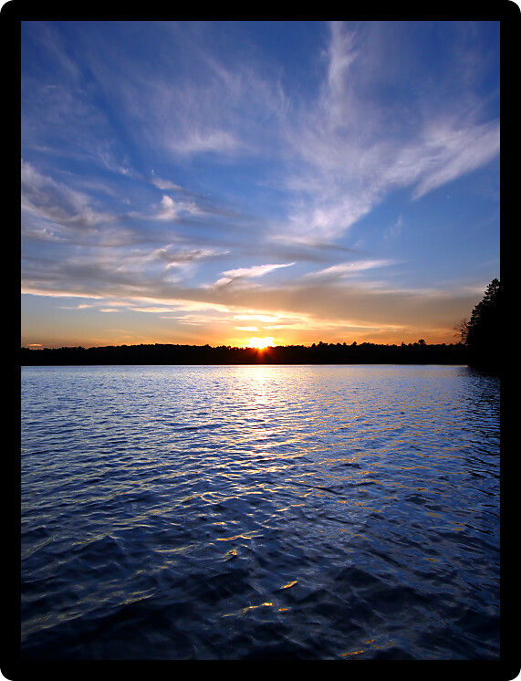 Sunlight reflects off ripples of Sweeney Lake in Wisconsin.