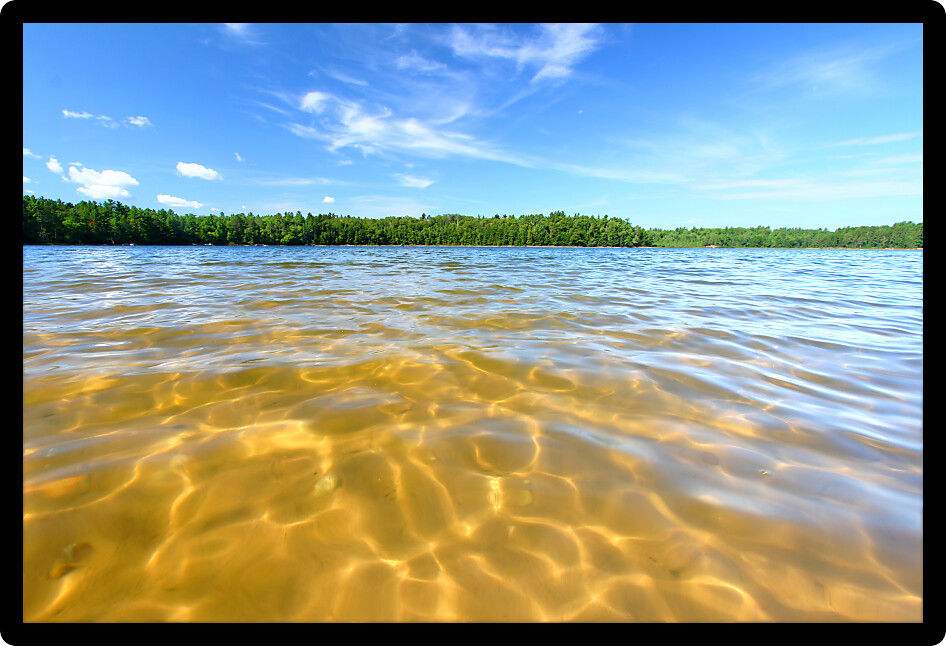 Beautiful swimming beach of a northwoods Wisconsin Lake.