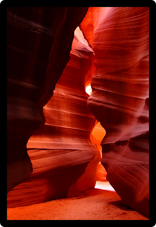 Patches of light illuminate the beautifully colored rock walls of Antelope Canyon in Arizona.
