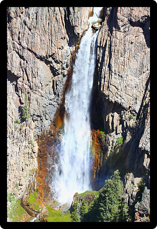 Bucking Mule Falls flows into a huge canyon in the Bighorn National Forest of Wyoming.