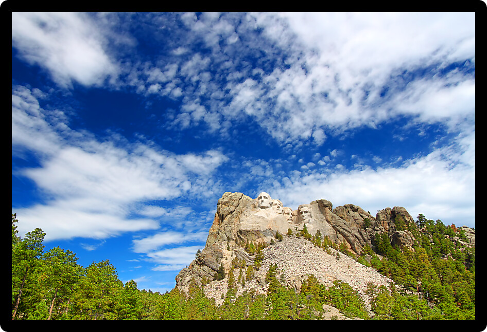 Mount Rushmore National Memorial carved into the peaks of the Black Hills in South Dakota.