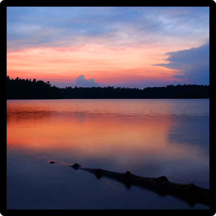 Brilliant colors of sunset over Buffalo Lake in the Northern Highland American Legion State Forest of Wisconsin.