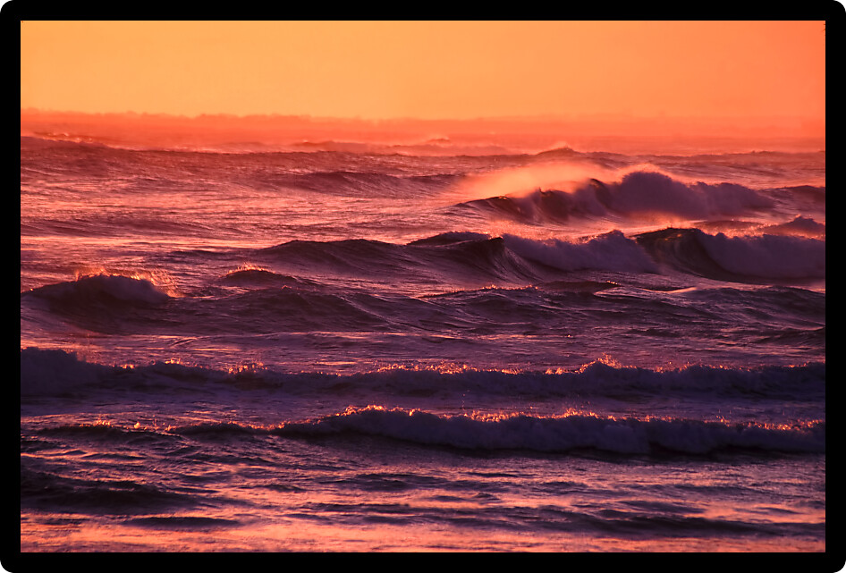 Ocean waves under a beautiful sunlit sky off the southern coast of Victoria Australia.