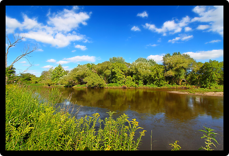 Kishwaukee River flows through Illinois on a beautiful day.