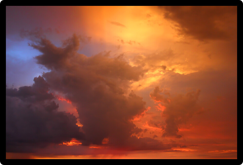 Beautiful summer sunset behind a strong thunderstorm in Indiana.