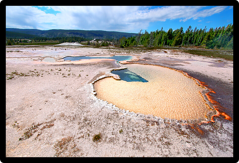 Doublet Pool is a crystal clear hot spring located in the Upper Geyser Basin of Yellowstone National Park.