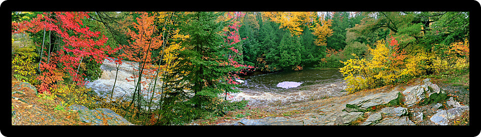 Cascades of the Falls River seen through beautiful autumn colors near L