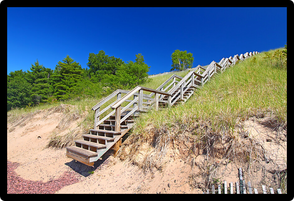 Staircase leads to a secluded beach along Lake Superior on the Keweenaw Peninsula Michigan.