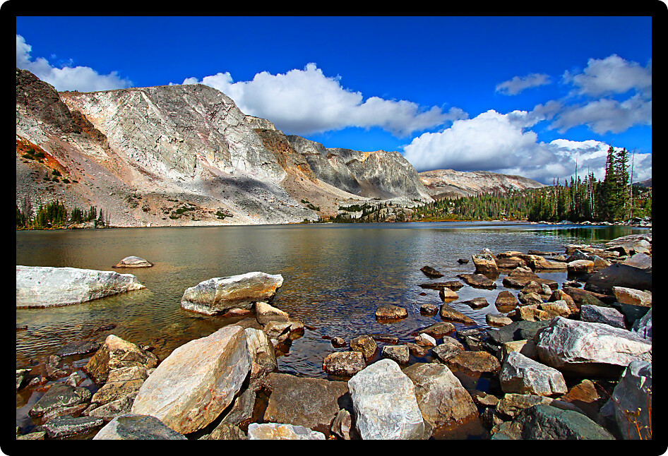 Lake Marie is a beautiful pristine mountain lake in the shadows of the Medicine Bow Mountain Range in Wyoming.