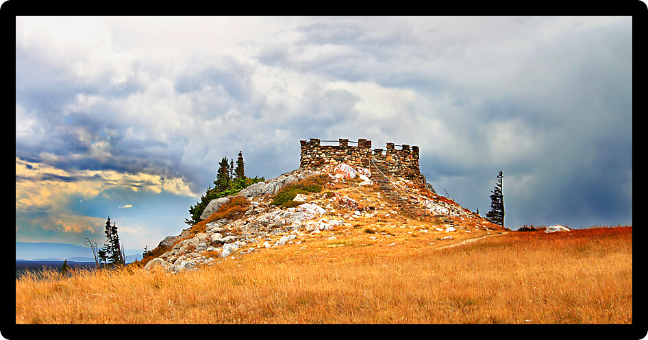Weathered stone lookout tower atop Snowy Range Pass in the Medicine Bow National Forest of Wyoming.