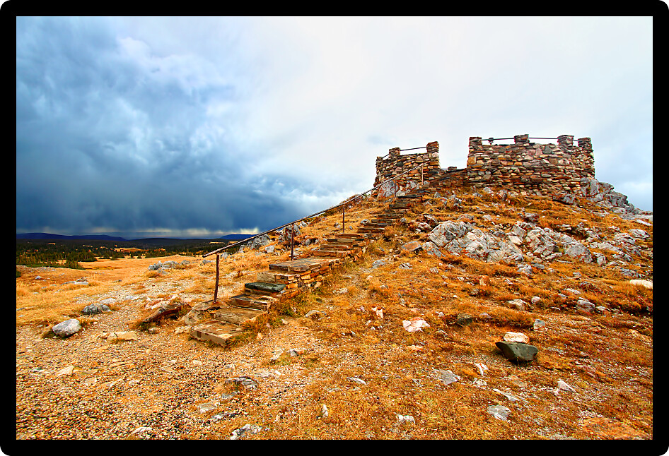 Weathered stone lookout tower atop Snowy Range Pass in the Medicine Bow National Forest of Wyoming.