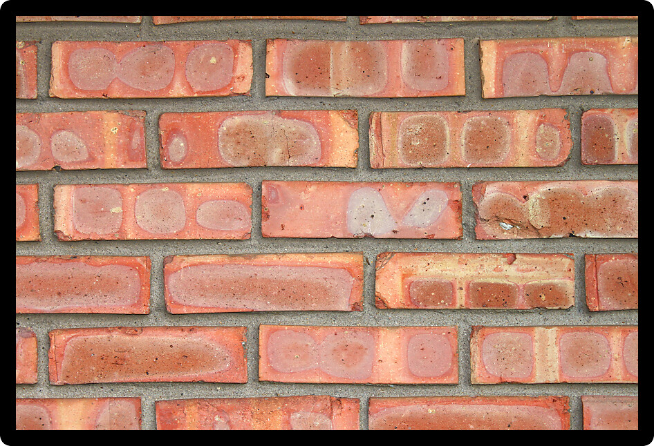 Brick background displaying vivid red colors.