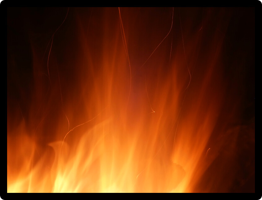 Bright whirl of flame and sparks light up the night.