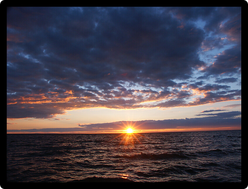 Evening as the sun sets over beautiful Lake Superior in northern Michigan.
