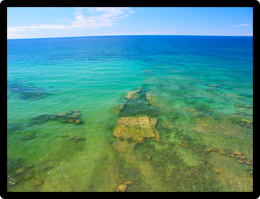 Cold turquoise waters of Lake Superior at Pictured Rocks National Lakeshore.
