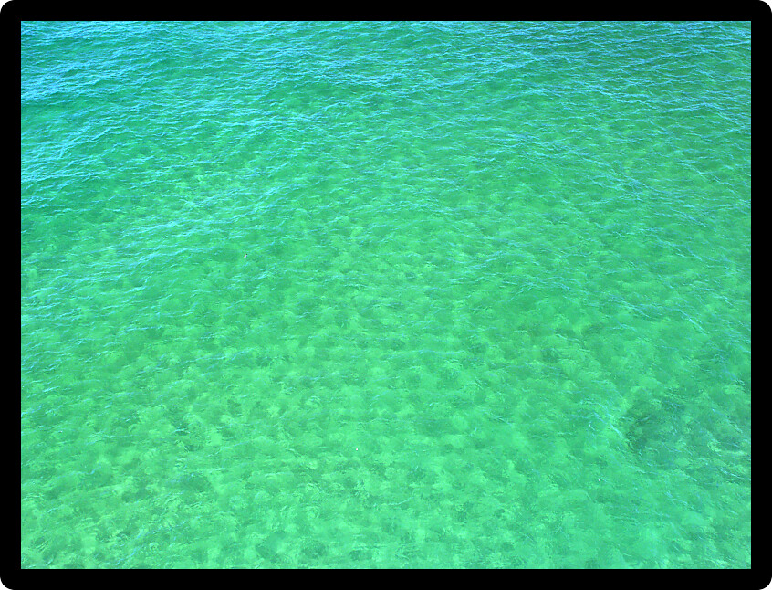 Stunning turquoise waters of Lake Superior at Pictured Rocks National Lakeshore.