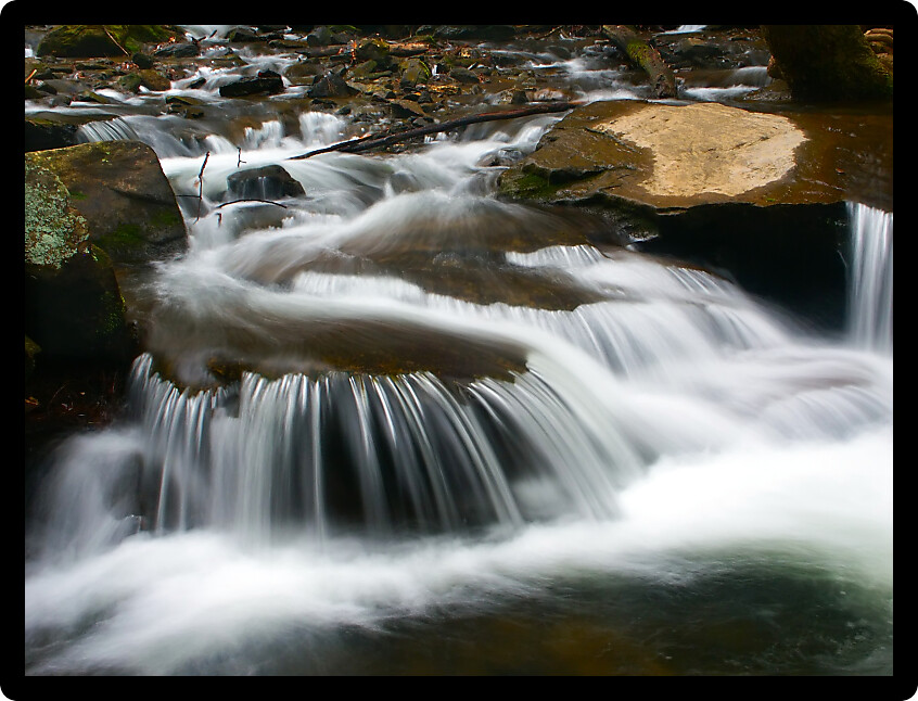 Tranquil cascade below Lake Trahlyta at Vogel State Park Georgia.