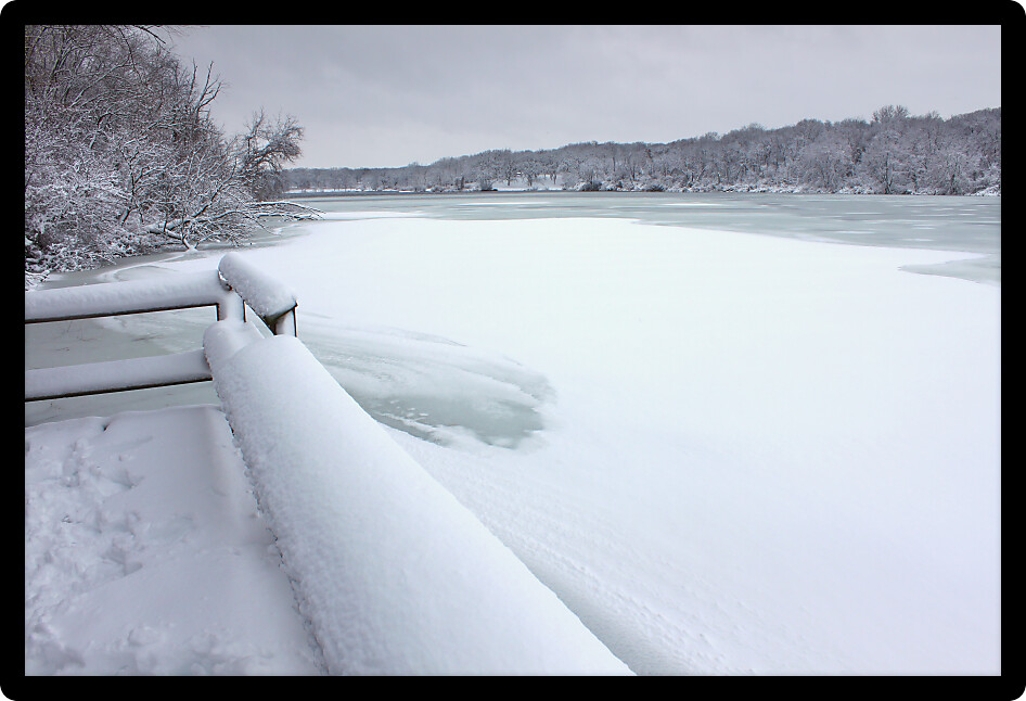 Freshly fallen snow on Pierce Lake at Rock Cut State Park in Illinois.