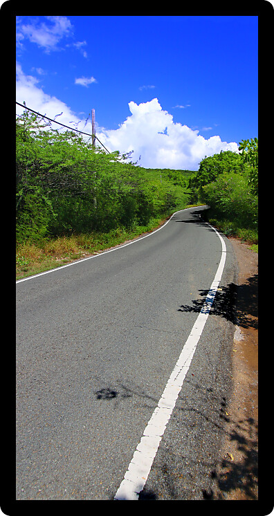 Perilously narrow two-lane road near Guanica in Puerto Rico.