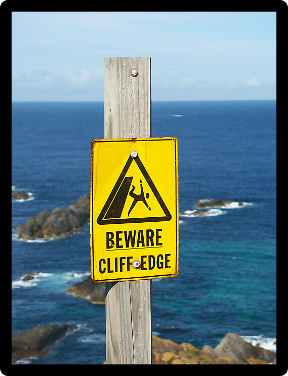 Beware of Cliff Edge Sign at Booti Booti National Park of Australia.