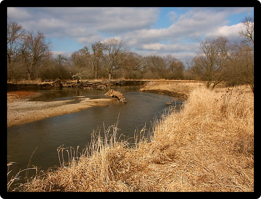 Kishwaukee River winds through northern Illinois on a sunny autumn day.