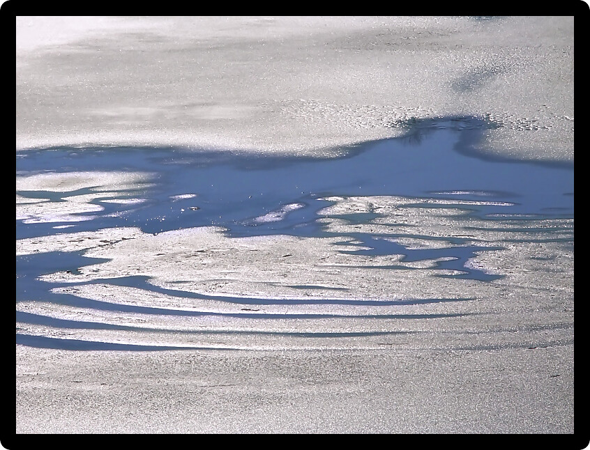 Melting ice on a lake of central Illinois.