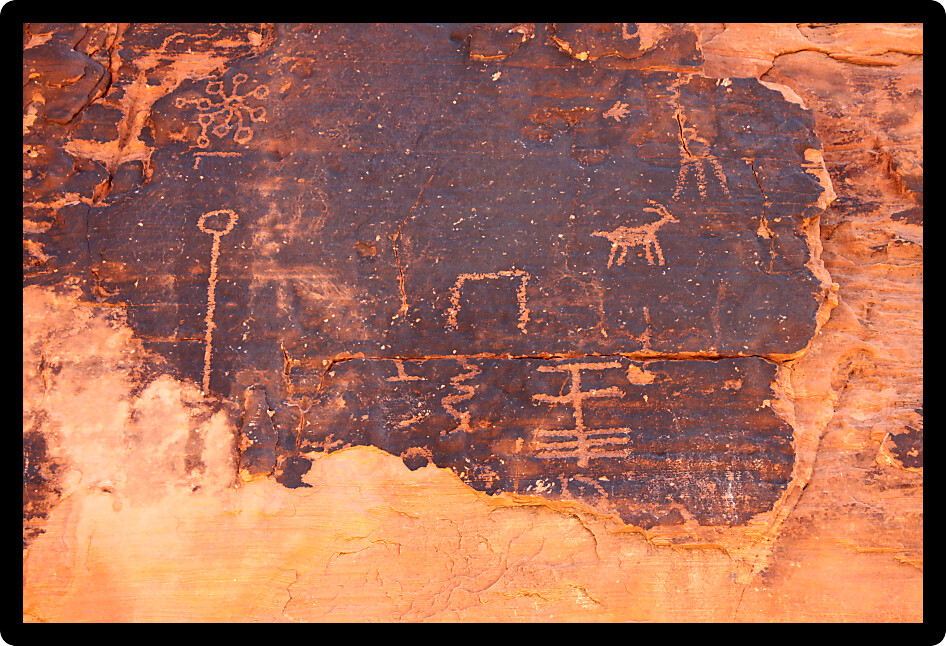 Interesting petroglyphs on a rock wall at Valley of Fire State Park in Nevada.