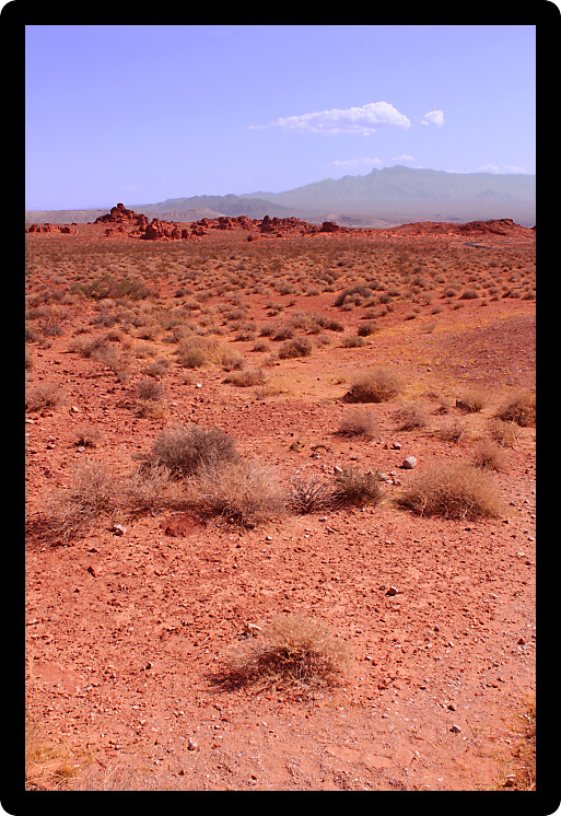 Vast red desert environment at Valley of Fire State Park in Nevada.