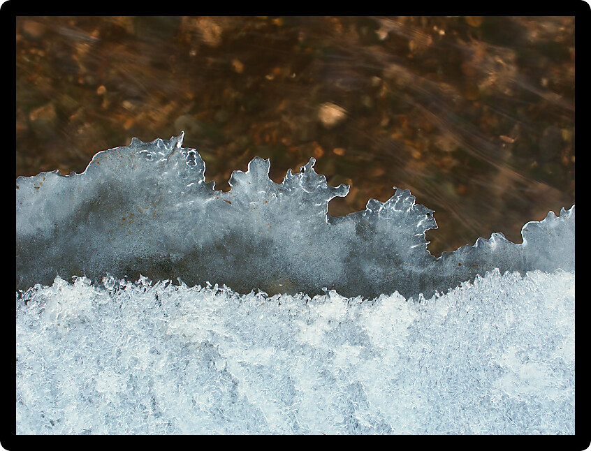 Beautiful ice patterns formed along a creek.