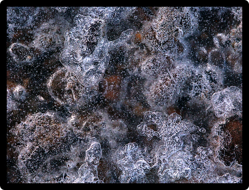 Beautiful ice patterns formed along a creek.