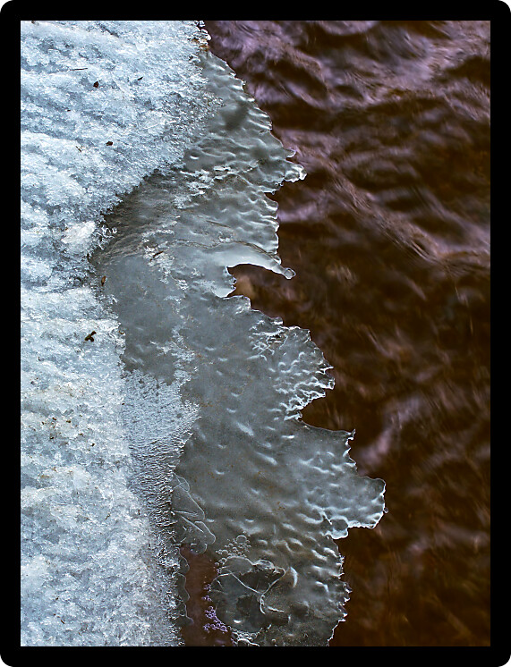 Beautiful ice patterns formed along a creek.