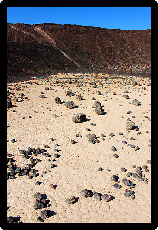 Volcanic rock scatters the center of Amboy Crater in the deserts of southern California.