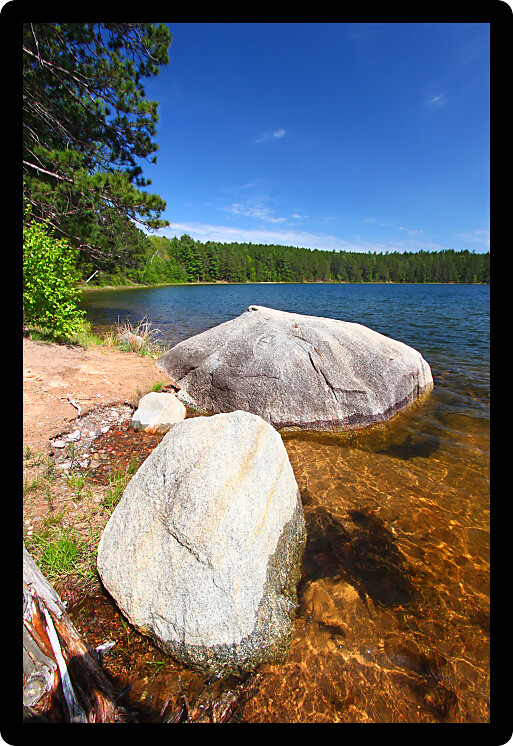 Huge boulder along the shoreline of Buffalo Lake in the Northern Highland-American Legion State Forest of Wisconsin.