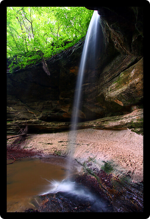 Water flows over beautiful Owl Canyon Falls at Starved Rock State Park of Illinois.
