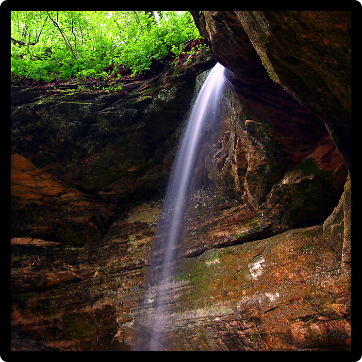 Water flows over beautiful Owl Canyon Falls at Starved Rock State Park of Illinois.