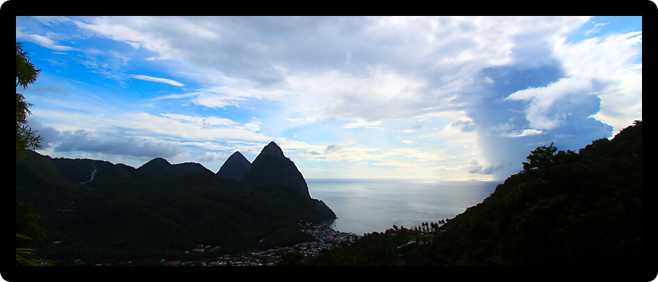 Prominent Pitons of Saint Lucia silhouetted against the sky.