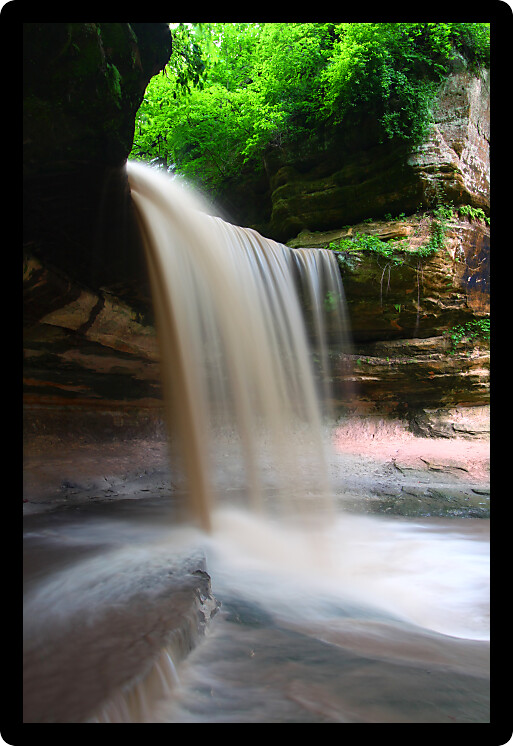 Spring rains create a beautiful scene at Lasalle Falls of Starved Rock State Park in central Illinois.