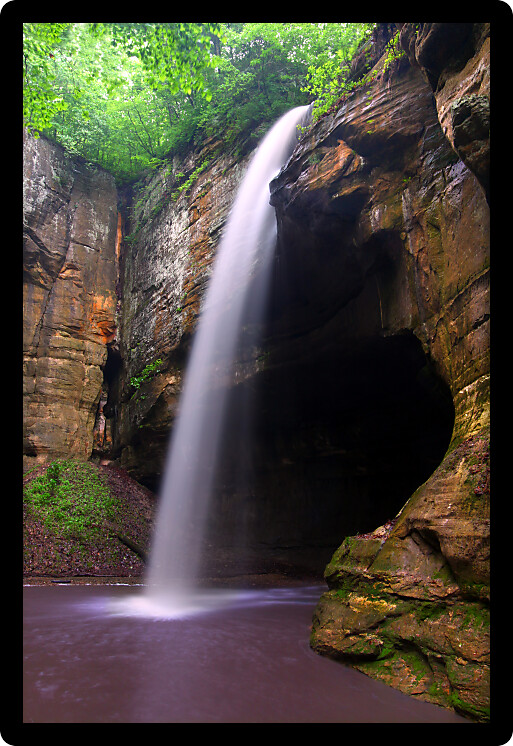 Surging waterfall crashes into Tonti Canyon on a spring day at Starved Rock State Park.