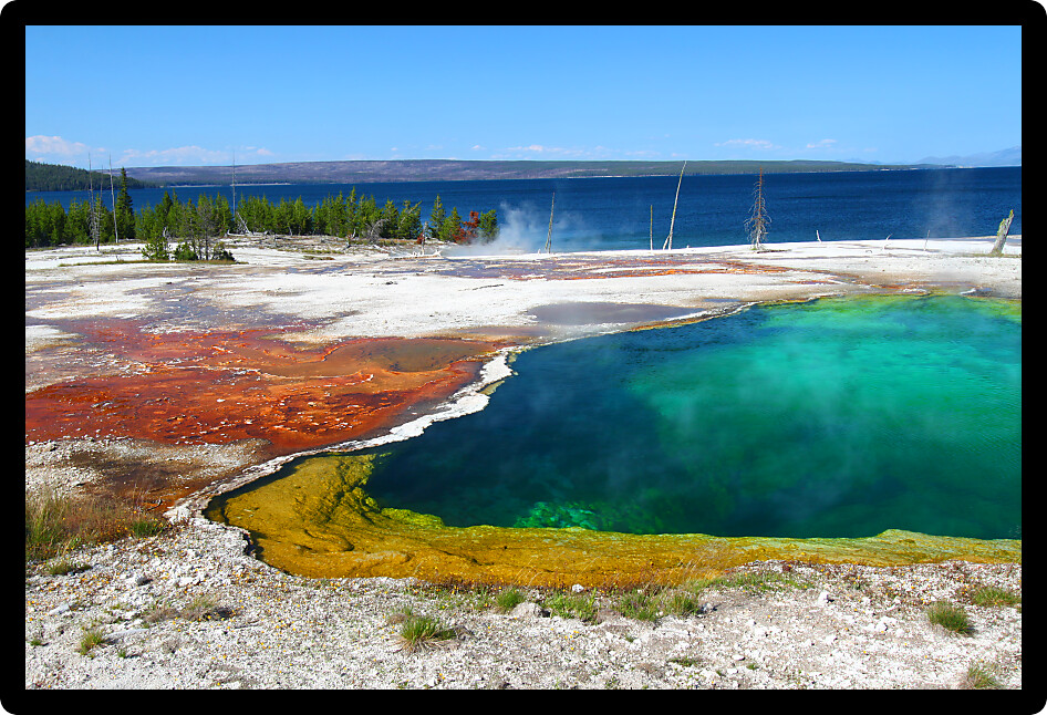 Dazzling colors of Abyss Pool in the West Thumb Geyser Basin of Yellowstone National Park.