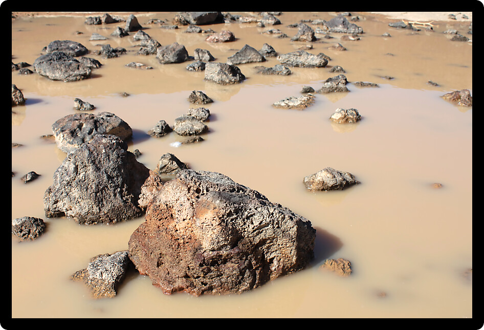 Small puddle at the bottom of Amboy Crater in the deserts of southern California.
