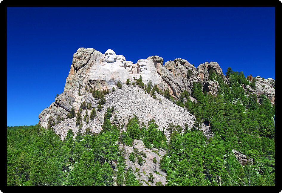 Mount Rushmore National Memorial carved into the peaks of the Black Hills in South Dakota.