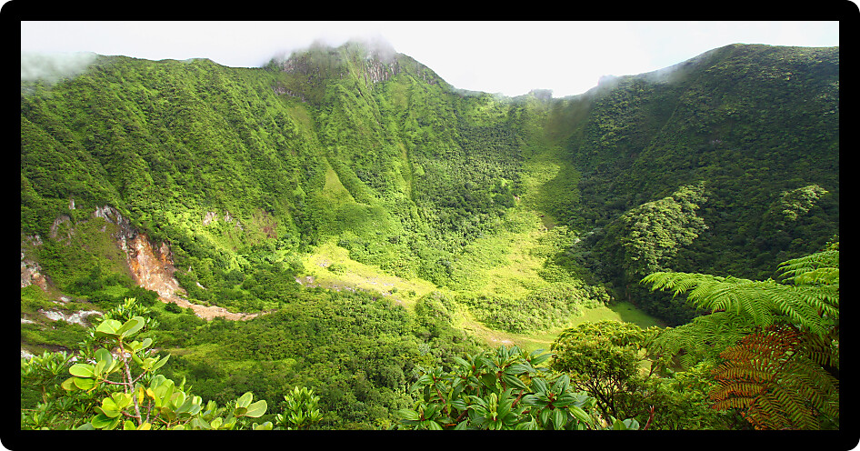 Crater below cloud covered Mount Liamuiga on Saint Kitts.
