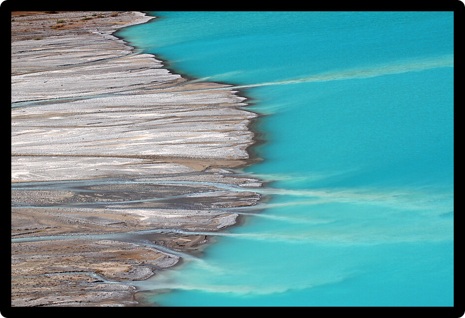 Meltwater from the Peyto Glacier flows into Peyto Lake in Banff National Park Canada.